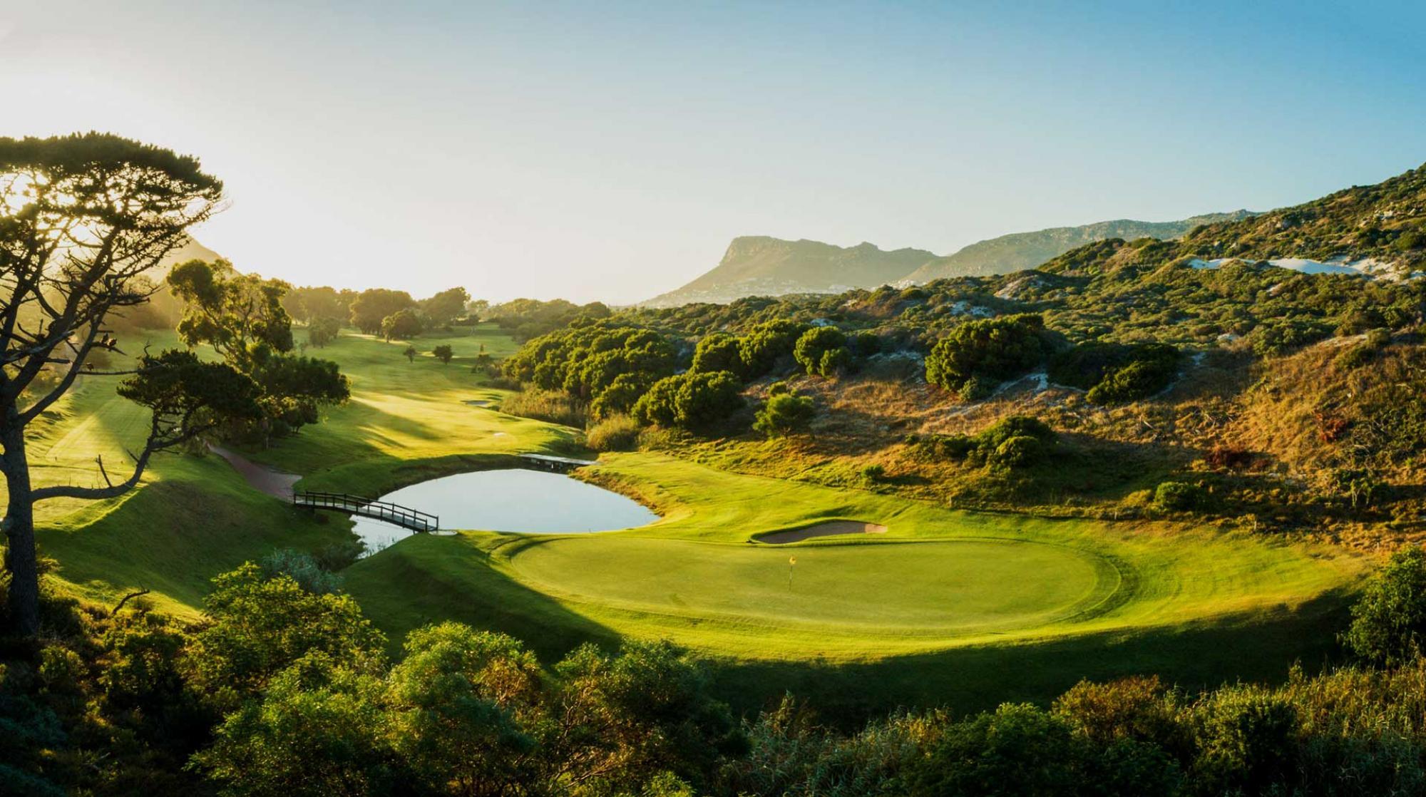 A smooth green next to a water hazard