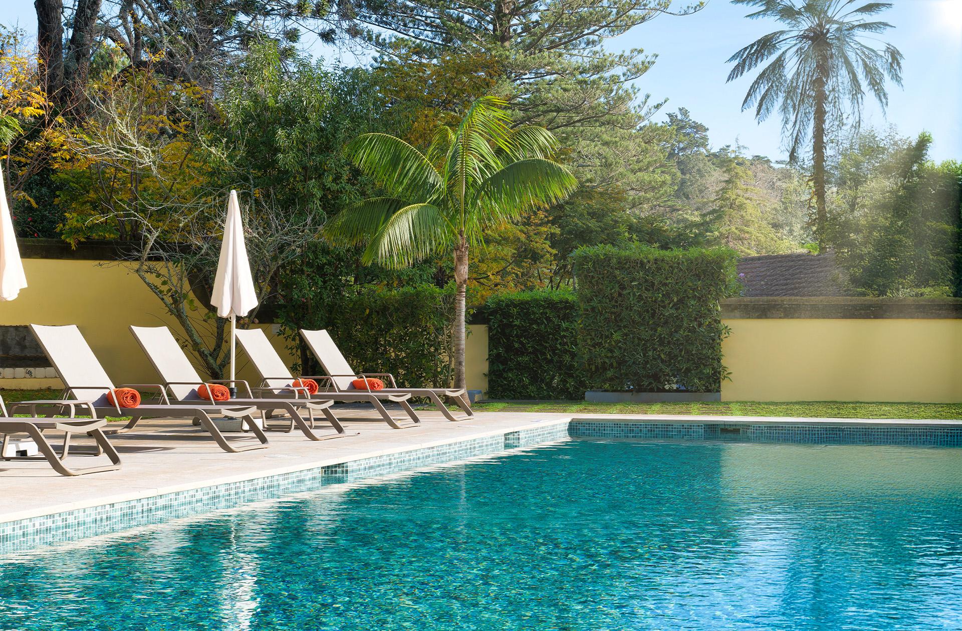 Outdoor swimming pool at Hotel Casa Velha do Palheiro - Relais & Chateaux