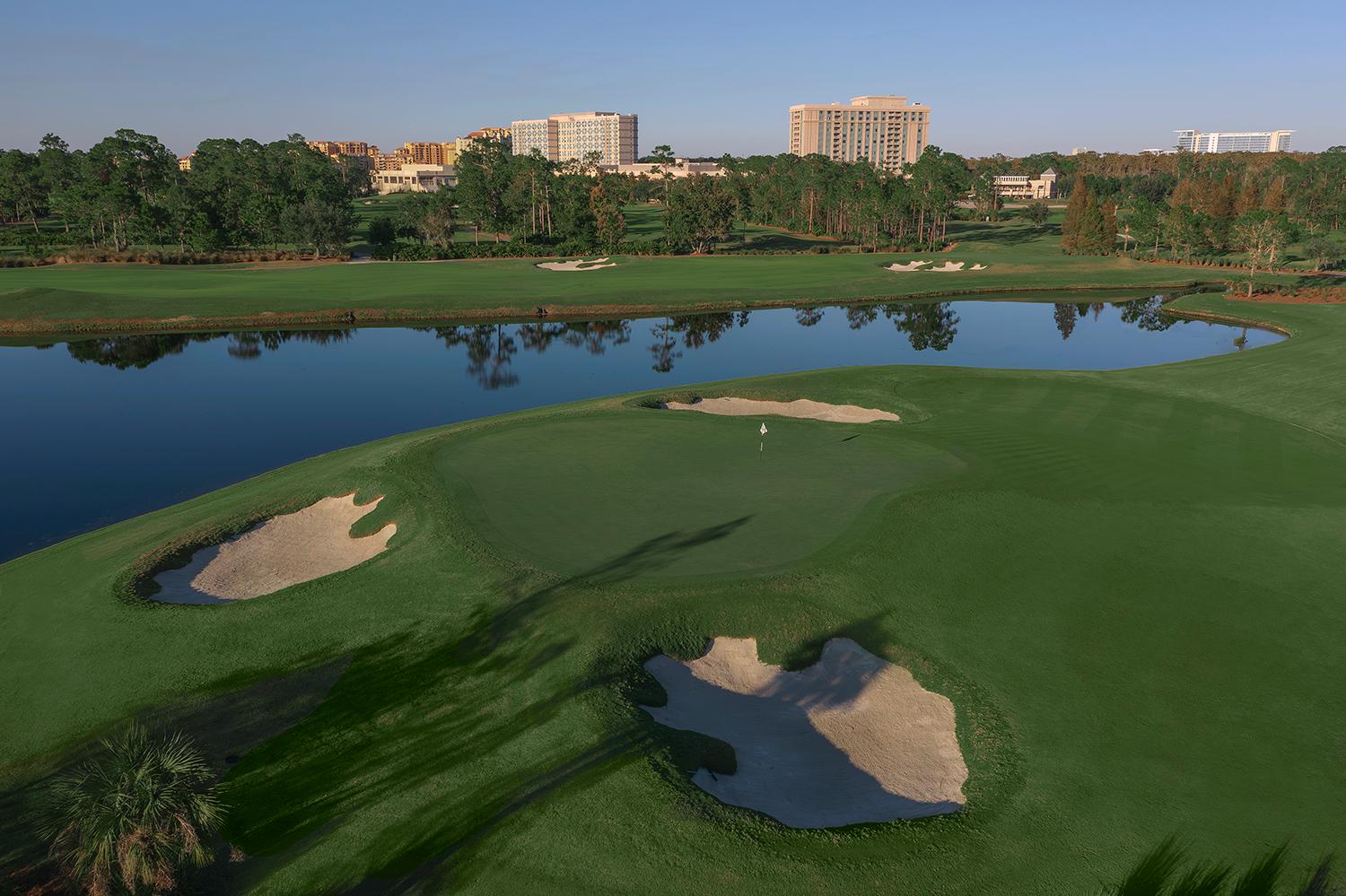 A smooth green surrounded by sand bunkers