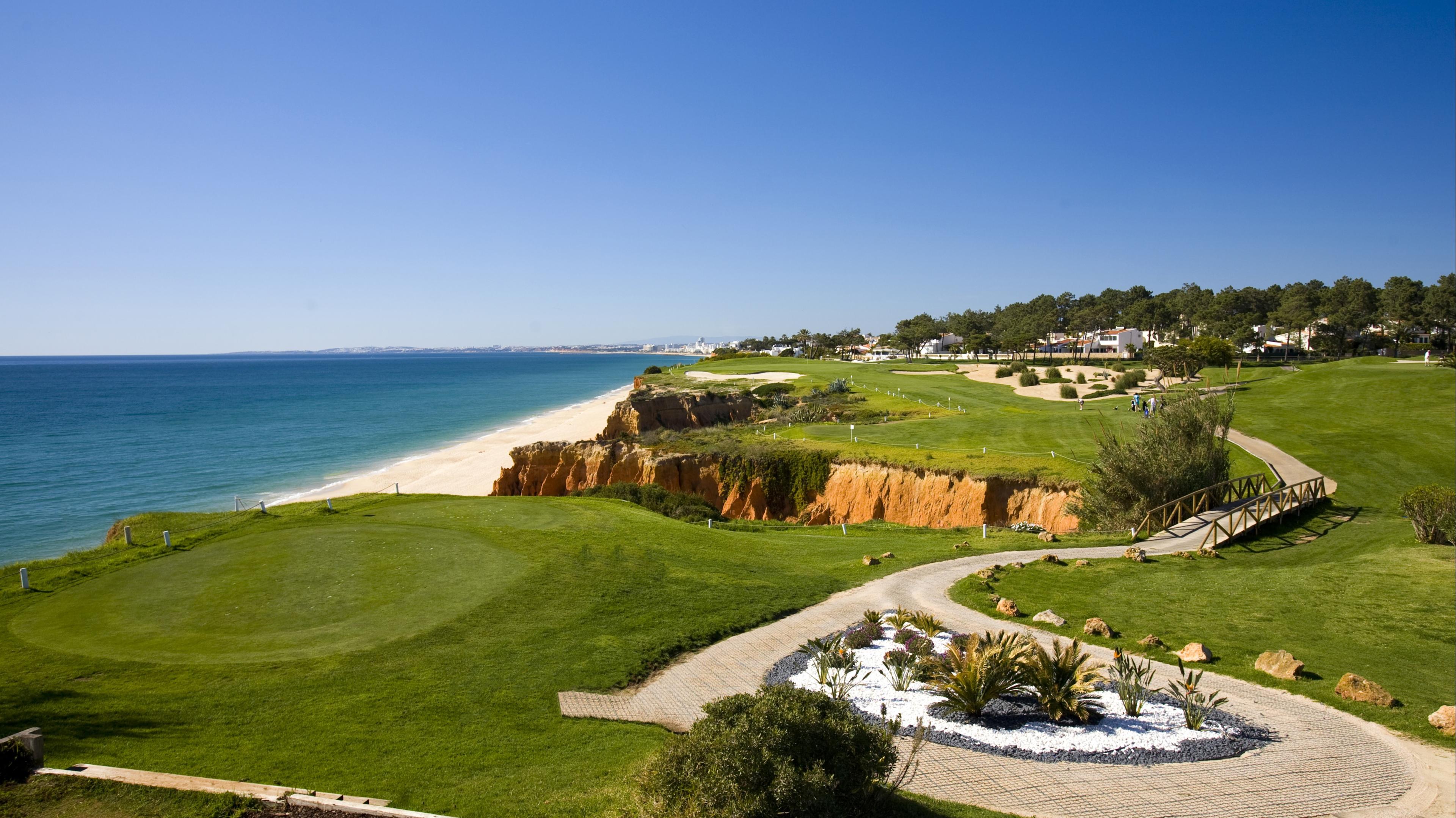 Overhead view of a coastal green with ocean views